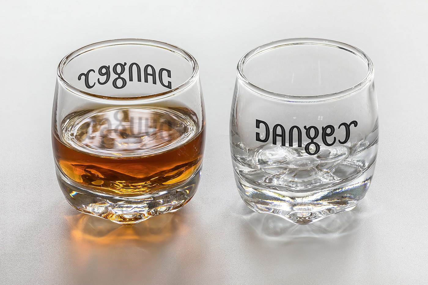 ambigram cognac danger glasses