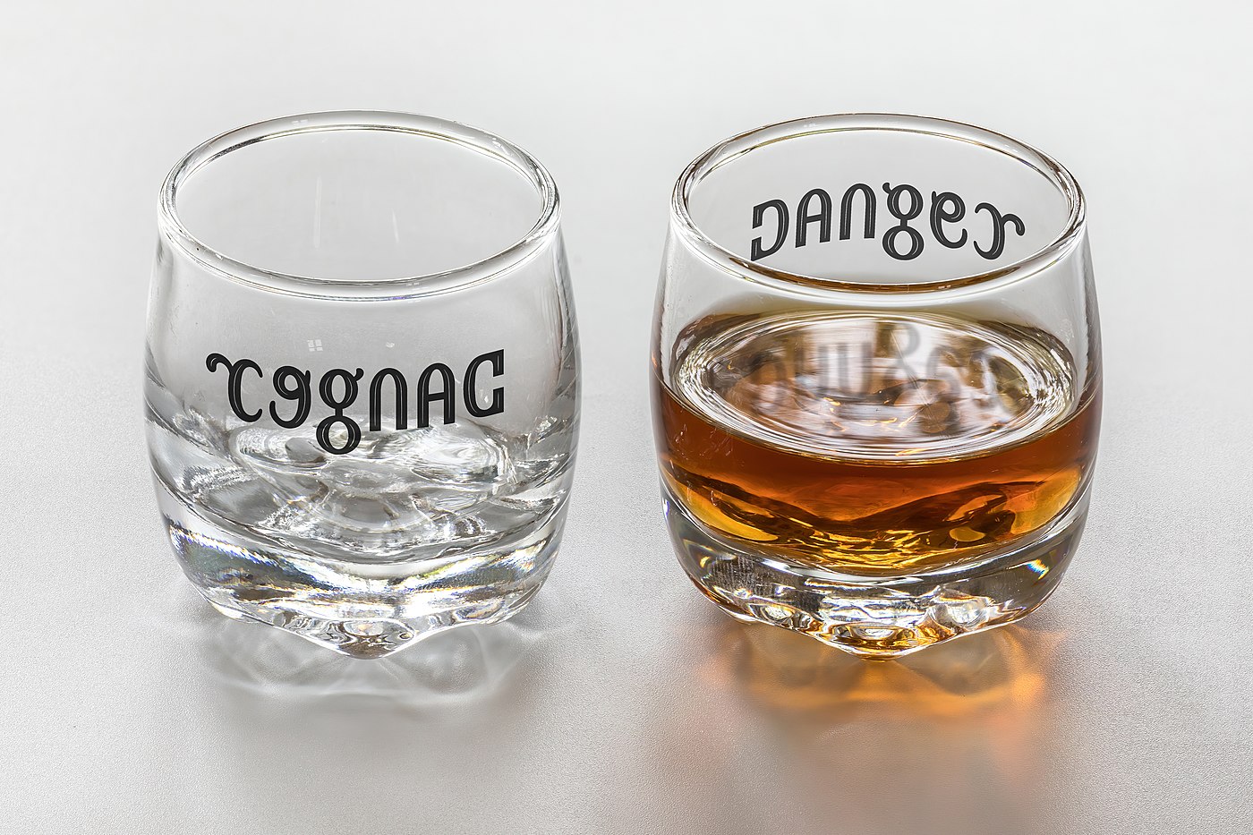 ambigram cognac danger glasses