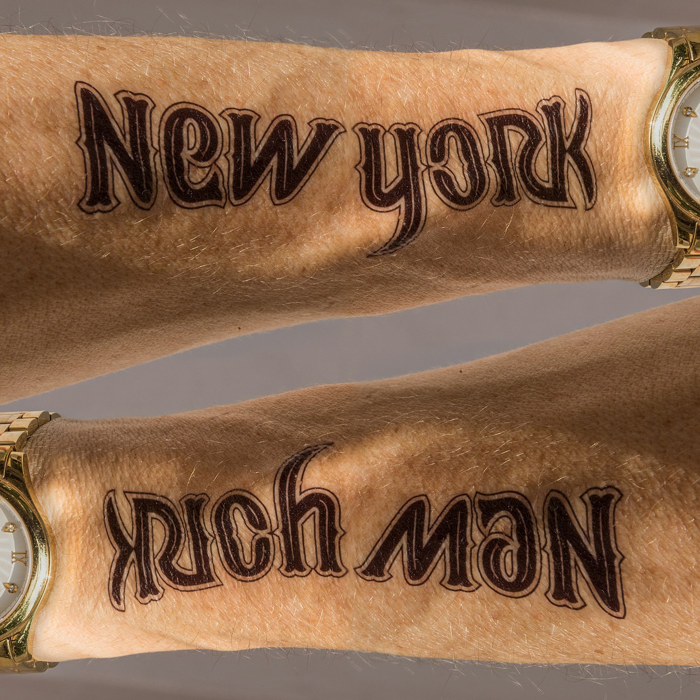 ambigram New york rich man tattoo