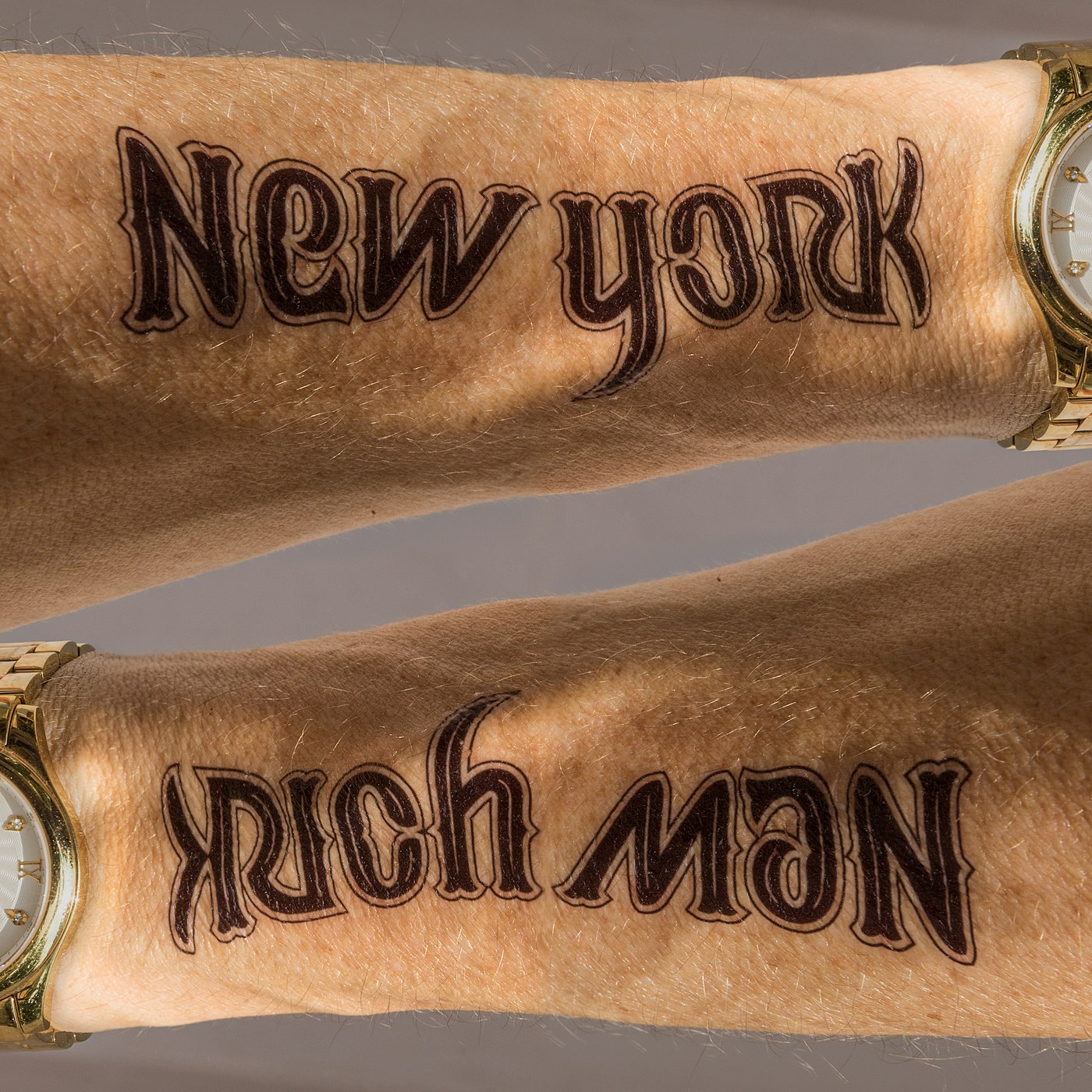 ambigram New york rich man tattoo