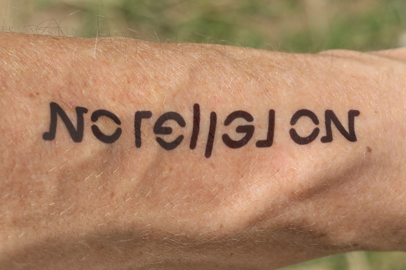 ambigram No religion tattoo