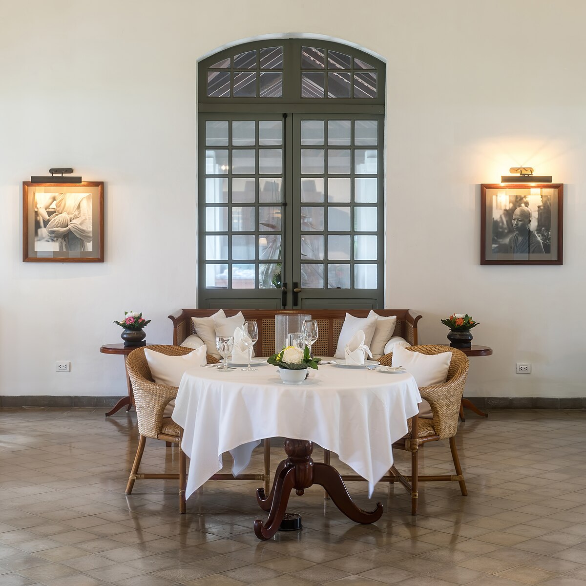 White tablecloth on restaurant table at Amantaka luxury Resort & Hotel in Luang Prabang Laos