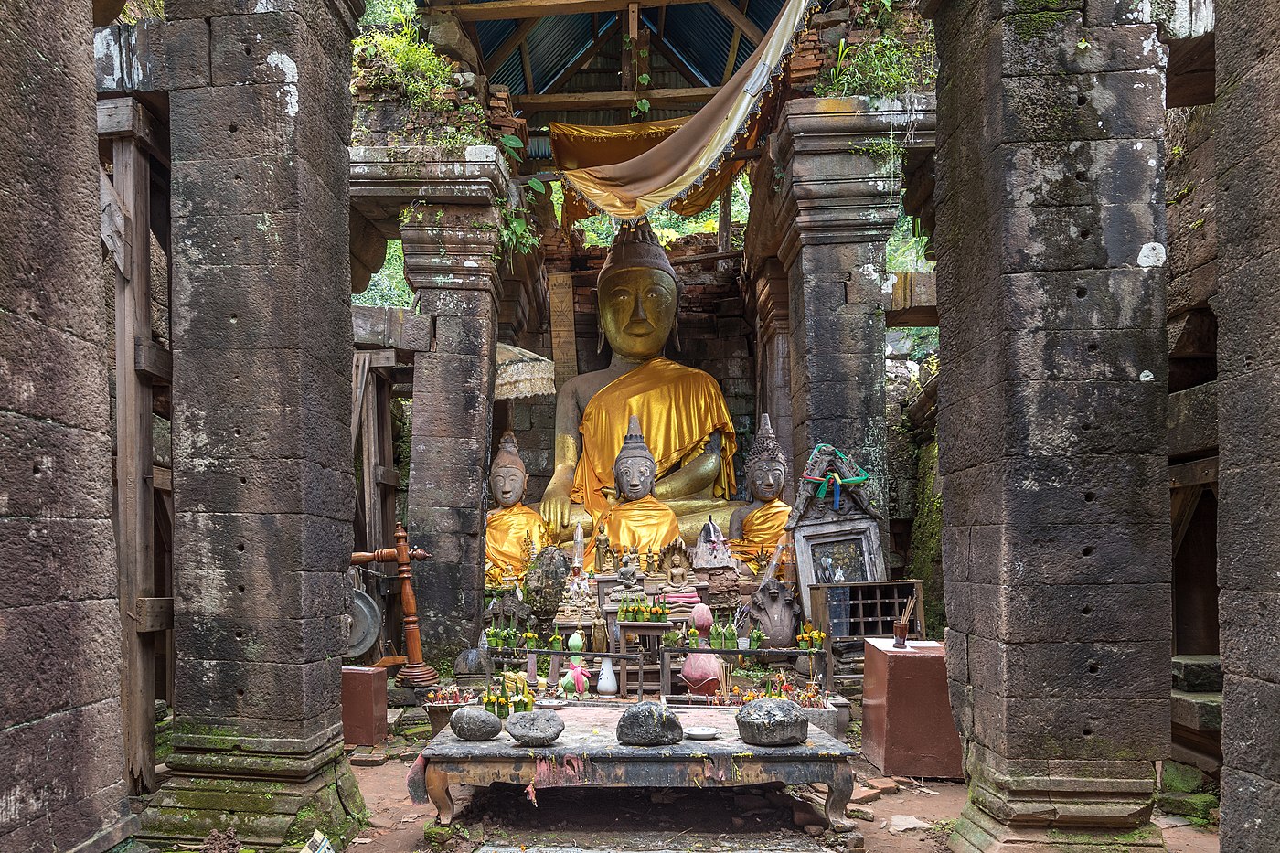 Clothed statues of the Buddha seated Wat Phou Champasak Laos