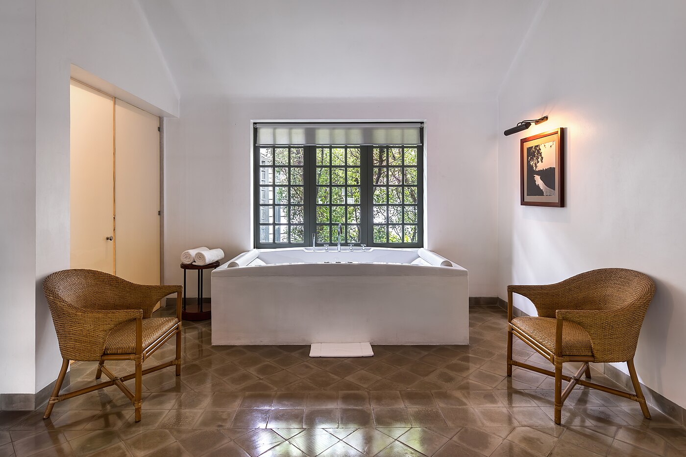 Spa bath and chairs in Amantaka luxury Resort & Hotel in Luang Prabang Laos