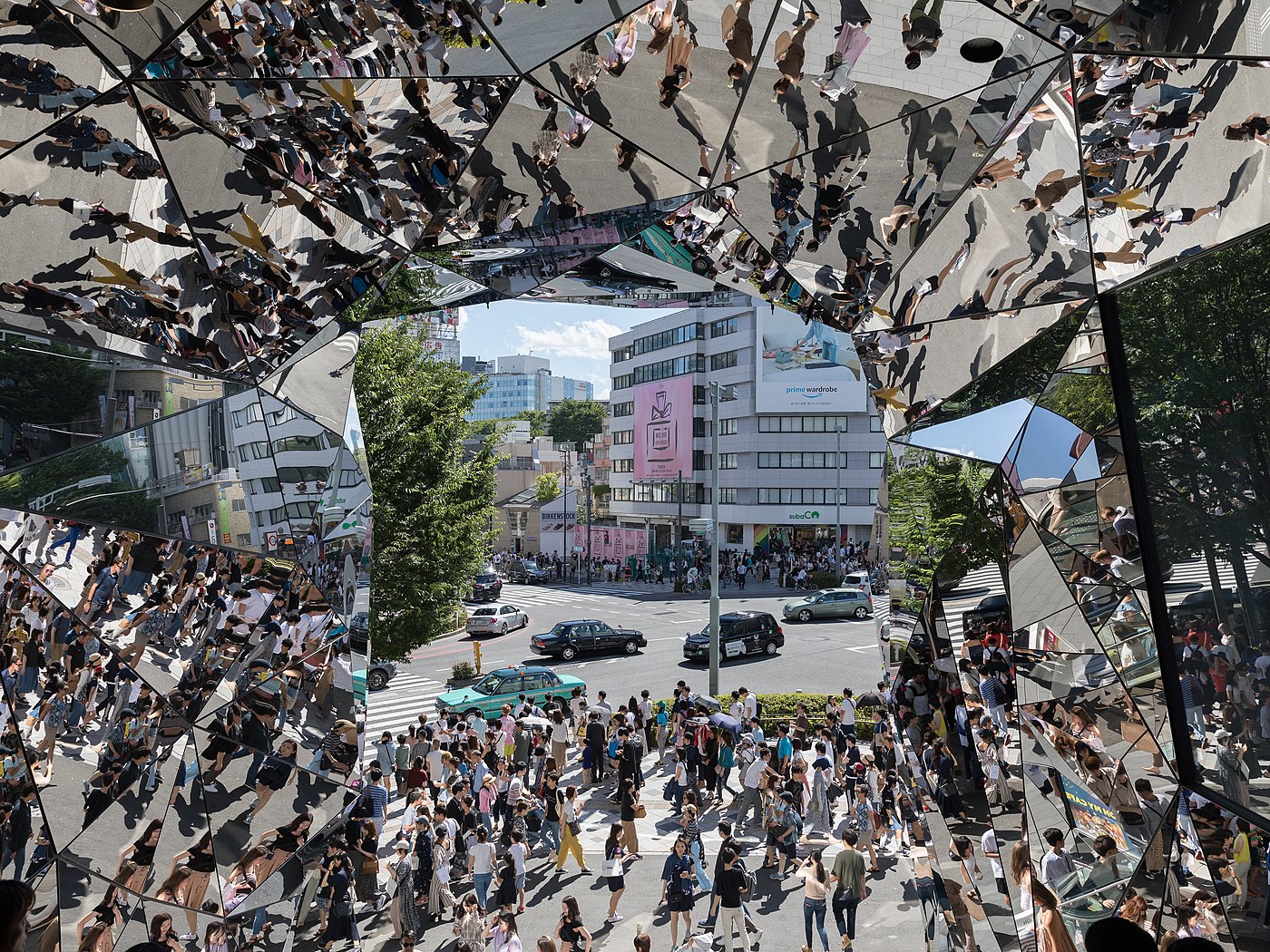 Street crowd reflecting in the polyhedral mirrors of Tokyu Plaza Omotesando, Harajuku station, Tokyo, Japan