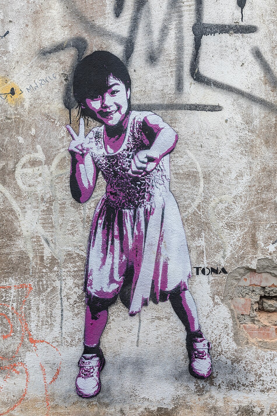 Street art stencil painting of a standing girl with crossed arms on black tiles by German artist Tona in Vientiane Laos